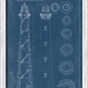 May include: A blueprint drawing of a lighthouse on a blue background. The drawing shows the lighthouse from the side and includes details of the interior, including the stairs and the lantern room. The text "Project for a Light-house at Hatteras, Submitted with a letter to the Lt. J.N. Macomb, Chief. Eng'r. / 2nd District, June 27th 1873." is visible at the top of the drawing.