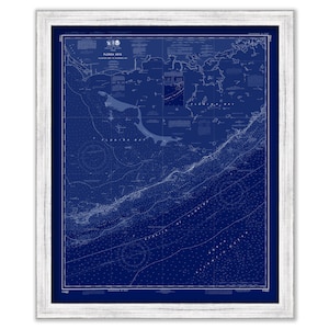 May include: A vintage nautical chart of the Florida Keys, printed in blue ink on a white background. The chart shows the coastline of the Florida Keys, including the islands of Key West, Marathon, and Islamorada. The chart also shows the surrounding waters, including the Gulf of Mexico and the Atlantic Ocean.