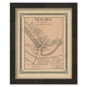 May include: Framed vintage map of Quechee, Vermont, featuring a detailed town layout with roads, buildings, and the Ottauquechee River. The map is in a black wooden frame, with the title "Quechee" at the top.