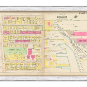 May include: An antique map of Boston, Massachusetts, showing the layout of the city's streets and buildings. The map is divided into sections, with each section labeled with a ward number. The map also includes a key that identifies different types of buildings, such as residential, commercial, and industrial. The map is printed in black and white, with some areas highlighted in pink and yellow.