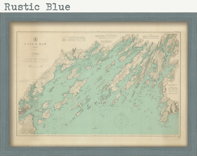 May include: A vintage map of Casco Bay, Maine, in a rustic blue frame. The map is printed on aged paper with a light blue and beige color scheme. The title "Casco Bay, Maine" is printed in the top left corner.