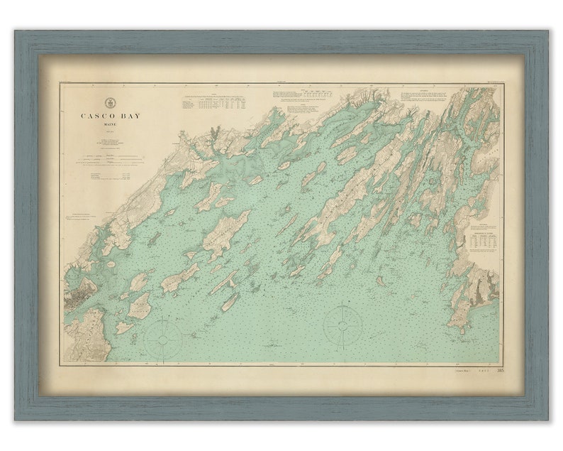 May include: A vintage map of Casco Bay, Maine, with detailed coastline and islands. The map is printed on aged paper with a light blue and green color scheme. The title "Casco Bay, Maine" is printed in the upper left corner.