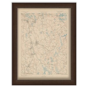 May include: A vintage map of Massachusetts, printed in black and white with blue and red accents. The map shows roads, towns, and bodies of water. The title of the map is "Massachusetts, U.S. Geological Survey, 1903."