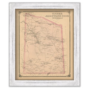 May include: An antique map of Upper Alloways Creek Township in Cumberland County, New Jersey. The map is printed in black and white with pink highlights. It shows roads, waterways, and the names of towns and settlements.