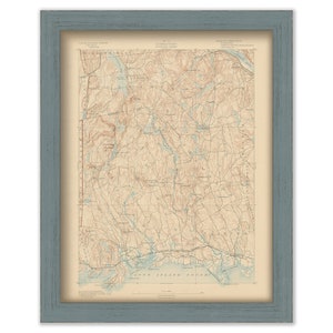 May include: Framed vintage map of Connecticut and Long Island Sound, featuring detailed topographical information. The map is in shades of brown, beige, and blue, with a blue-gray wooden frame. A classic piece of cartography.