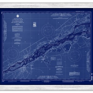 May include: A vintage nautical chart of the St. Lawrence River, printed in blue ink on a white background. The chart shows the river from Croil Island to Legardeur Pt. and includes depth soundings in feet.