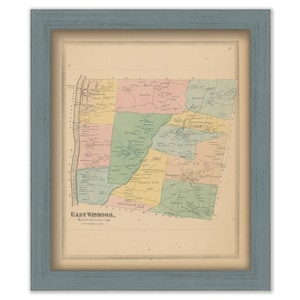 May include: An antique map of East Windsor, Hartford County, Connecticut, showing the different districts of the town. The map is printed in black and white with colored borders for each district. The map is framed in a light blue frame.