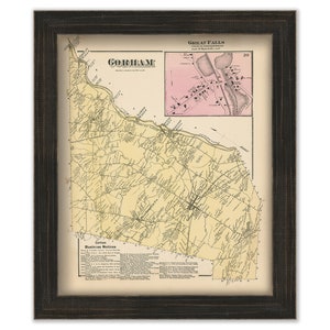 May include: Framed vintage map of Gorham, featuring a detailed cartographic representation with roads, rivers, and geographical features. The map includes a smaller inset of Great Falls. The frame is dark brown.