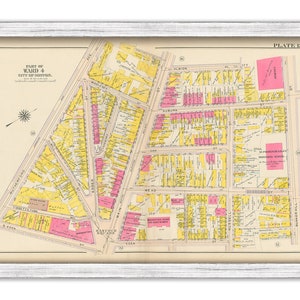 May include: A vintage map of part of Ward 4 in the City of Indianapolis, Indiana. The map is printed on cream-colored paper and features yellow and pink blocks with street names and numbers. The map is framed in a white frame.
