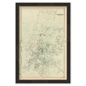 May include: An antique map of Stoneham, Massachusetts, printed in green and black ink on a cream-colored background. The map shows the town's streets, parks, and buildings.