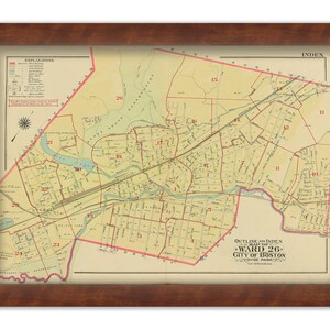 May include: A vintage map of Ward 26 in Boston, Massachusetts. The map is printed in red, black, and blue on a cream-colored background. The map shows the boundaries of the ward, as well as the locations of streets, parks, and other landmarks. The map is titled "Outline and Index Map of Ward 26, City of Boston, Hyde Park."