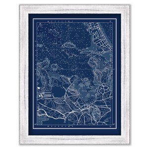 May include: A framed nautical chart of Hull Bay, a body of water with islands and inlets. The chart is printed in white on a dark blue background.