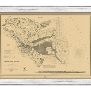 May include: A vintage map of Newport Harbor, Rhode Island, with detailed markings of the harbor and surrounding land. The map is printed on aged paper with a cream background and black ink. The title "NEWPORT HARBOR, RHODE ISLAND" is printed at the bottom of the map.