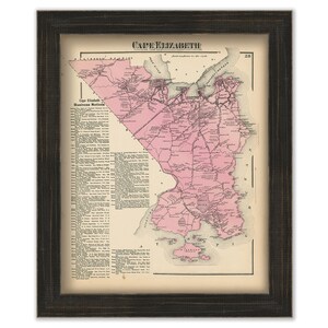 May include: An antique map of Cape Elizabeth, Maine, printed in black and white with a pink overlay. The map shows the town's streets, roads, and landmarks. The title "Cape Elizabeth, Maine" is printed at the top of the map.