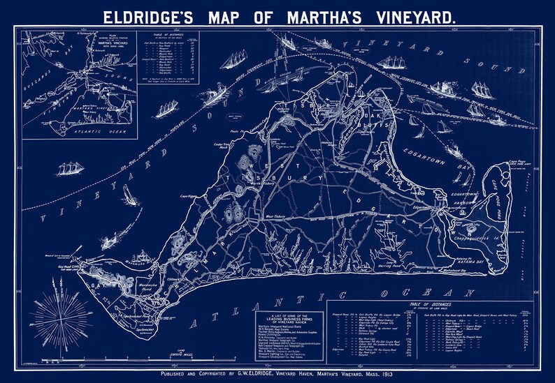 May include: A vintage, blue and white map of Martha's Vineyard, Massachusetts. The map shows the island's roads, towns, and bodies of water. The map is titled "Eldridge's Map of Martha's Vineyard." and is dated 1913.