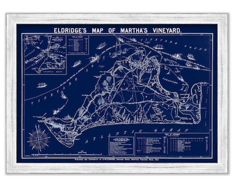 May include: A vintage blue and white map of Martha's Vineyard, Massachusetts, by Eldridge. The map shows the island's coastline, towns, and roads. It includes a compass rose and a key with points of interest.
