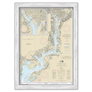 May include: A nautical chart of the Potomac River from Washington, D.C. to the Chesapeake Bay. The chart is printed on paper and framed in a white wood frame.