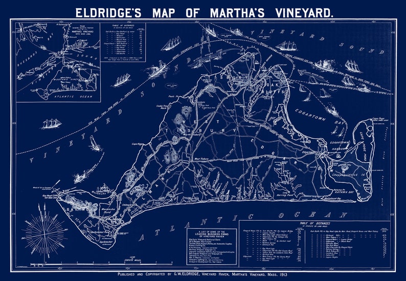 May include: A vintage, blue and white map of Martha's Vineyard, Massachusetts. The map shows the island's roads, towns, and bodies of water. The map is titled "Eldridge's Map of Martha's Vineyard." and is dated 1913.