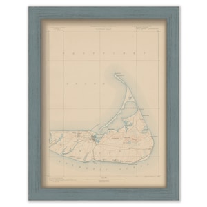 May include: A vintage map of Nantucket Island, Massachusetts, printed on cream-colored paper with blue and brown details. The map shows the island's coastline, roads, and towns. The title "Nantucket Island, Massachusetts" is printed at the top of the map.