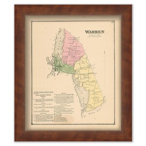 May include: An antique map of Warren, Bristol Co., R.I. from 1855. The map is printed on paper and shows the different districts of Warren, including the town of Warren, the village of Warren, and the village of Bristol. The map is framed in a brown wooden frame.