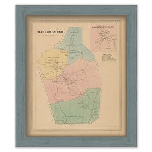 May include: A vintage map of Marlborough, Massachusetts, showing the different districts of the town. The map is printed in black and white with colored lines and areas to indicate the different districts. The map is framed in a light blue frame.