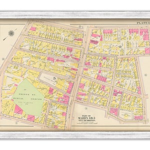 May include: A vintage map of Boston, Massachusetts, showing the layout of Wards 4 & 5. The map is printed on cream-colored paper with yellow and pink highlights. The map includes street names, landmarks, and a key.