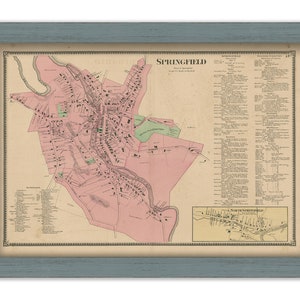 May include: An antique map of Springfield, Massachusetts, with a pink background and detailed street layout. The map includes a key with names of streets, businesses, and landmarks. The map also includes a smaller inset map of North Springfield.