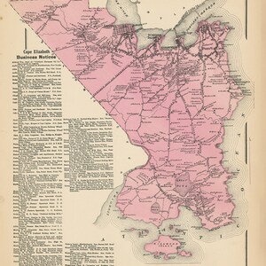 May include: A vintage map of Cape Elizabeth, Maine, with a pink background and black lines showing roads and waterways. The map includes the text "Cape Elizabeth" and "Business Notices" with a list of businesses and their addresses.