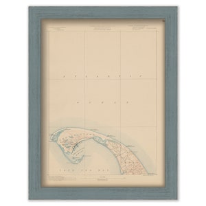 May include: A vintage map of Cape Cod Bay, Massachusetts, printed on cream-colored paper and framed in a light blue wood frame. The map shows the coastline, towns, and waterways of the area. The title of the map is "The Coast of Cape Cod from Provincetown to Chatham, Massachusetts."