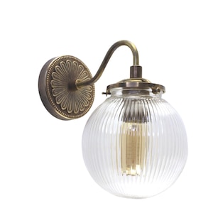 Curved Brass Wall Sconce with 6-inch Ripple Glass Globe - Solid Cast Brass Wall Lamp - Vintage Inspired Reeded Globe Dimmable Wall Light
