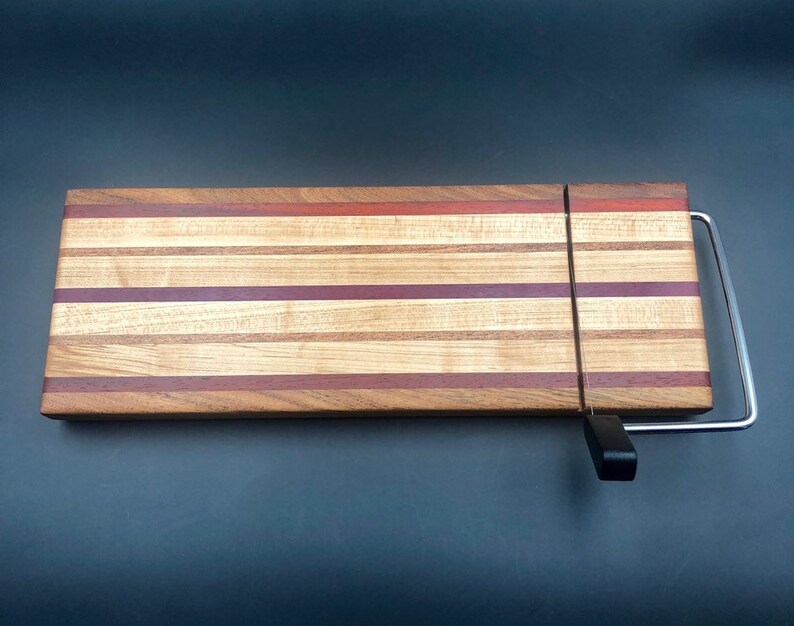 Cheeseboard made from Mesquite Padauk and Purpleheart wood! Maple