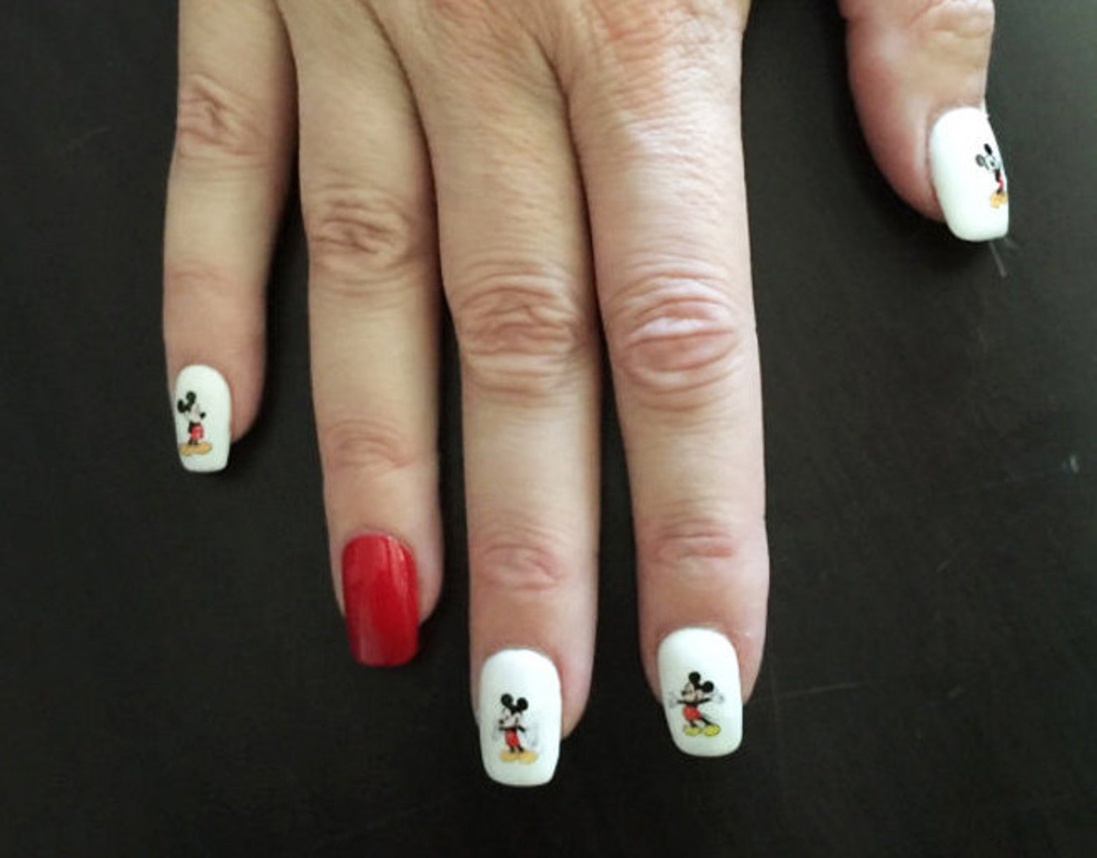 5. Red and Black Mickey Mouse Nail Art - wide 6