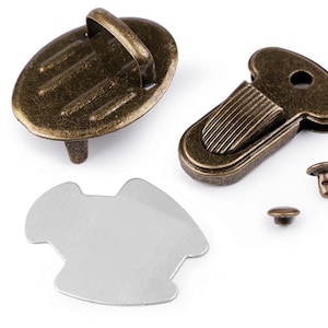 May include: Antique brass-toned purse hardware set, including an oval clasp with a handle, a rectangular clasp, a metal plate, and two rivets. The hardware has a vintage aesthetic, suitable for bags and other craft projects.
