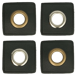 Könnte beinhalten: Vier schwarze quadratische Lederflicken mit Metallösen. Zwei Flicken haben messingfarbene Ösen und zwei haben silberfarbene Ösen. Jeder Flicken ist an den Rändern genäht.