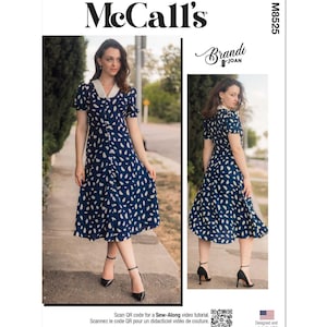 Op de afbeelding: Een McCall's naaipatroon voor een jurk met een witte kraag en een blauwe en witte stippenprint. Het patroonnummer is M8525. Het patroon is ontworpen door Brandi Joan.