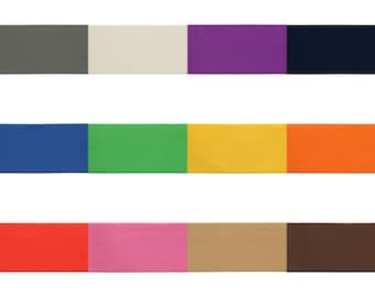 May include: A collection of fabric swatches in various colours, including grey, white, purple, navy blue, blue, green, yellow, orange, red, pink, beige, and brown.