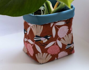 Pot plant cover - piwakawaka
