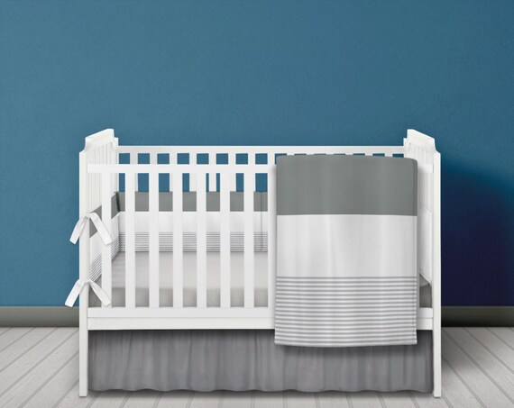 grey and white cot bedding set