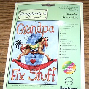 May include: A counted cross stitch pattern for a rocking horse with the text "A Grandpa Can Fix Stuff". The pattern is by Alma Lynne and is part of the Simplicities by Janlynn collection. The finished size is 5 inches by 7 inches.