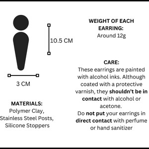 Op de afbeelding: Een zwart silhouet van een oorbel van 10,5 cm bij 3 cm. Tekstdetails: Gewicht per oorbel: ongeveer 12g. Materialen: polymeerklei, roestvrijstalen stekers, siliconen stoppers. Onderhoud: vermijd contact met alcohol, aceton, parfum of handgel.