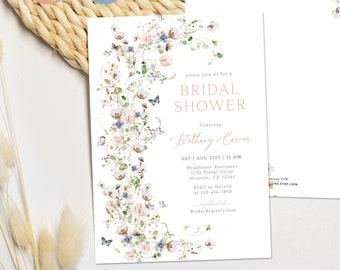 May include: A floral bridal shower invitation with a watercolor design of pink and blue flowers, leaves, and butterflies. The text reads "Please join us for a Bridal Shower honoring Brittany Carver" with the date, time, and location of the event.