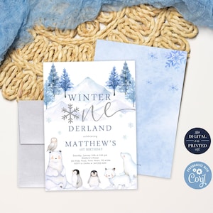 May include: A blue and white winter wonderland themed first birthday party invitation with a watercolour illustration of a snowy mountain, pine trees, and polar bears. The text reads "Winter One Derland celebrating Matthew's 1st Birthday".