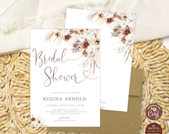 Może przedstawiać: Białe zaproszenie na wieczór panieński z kwiatowym wzorem w odcieniach brązu i bieli. Tekst głosi "Bridal Shower" z symbolem serca i "Regina Arnold" większą czcionką. Zaproszenie zawiera datę, godzinę i miejsce wydarzenia.