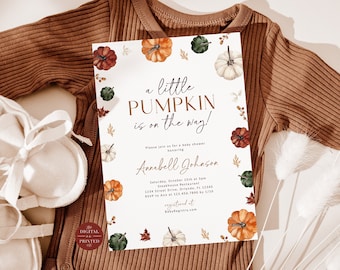 May include: A white baby shower invitation featuring a watercolour pumpkin design. The invitation reads "A little pumpkin is on the way!" and includes the name "Annabell Johnson".