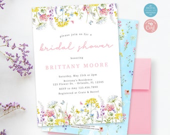 May include: A bridal shower invitation with floral watercolor design. The invitation features the text "please join us for a bridal shower honoring Brittany Moore". Includes a light blue floral patterned envelope and a pink envelope.