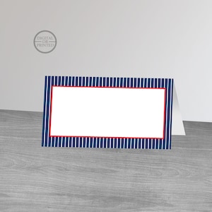 May include: A blue and white striped place card with a red border. The card is blank and ready to be personalized with a name.