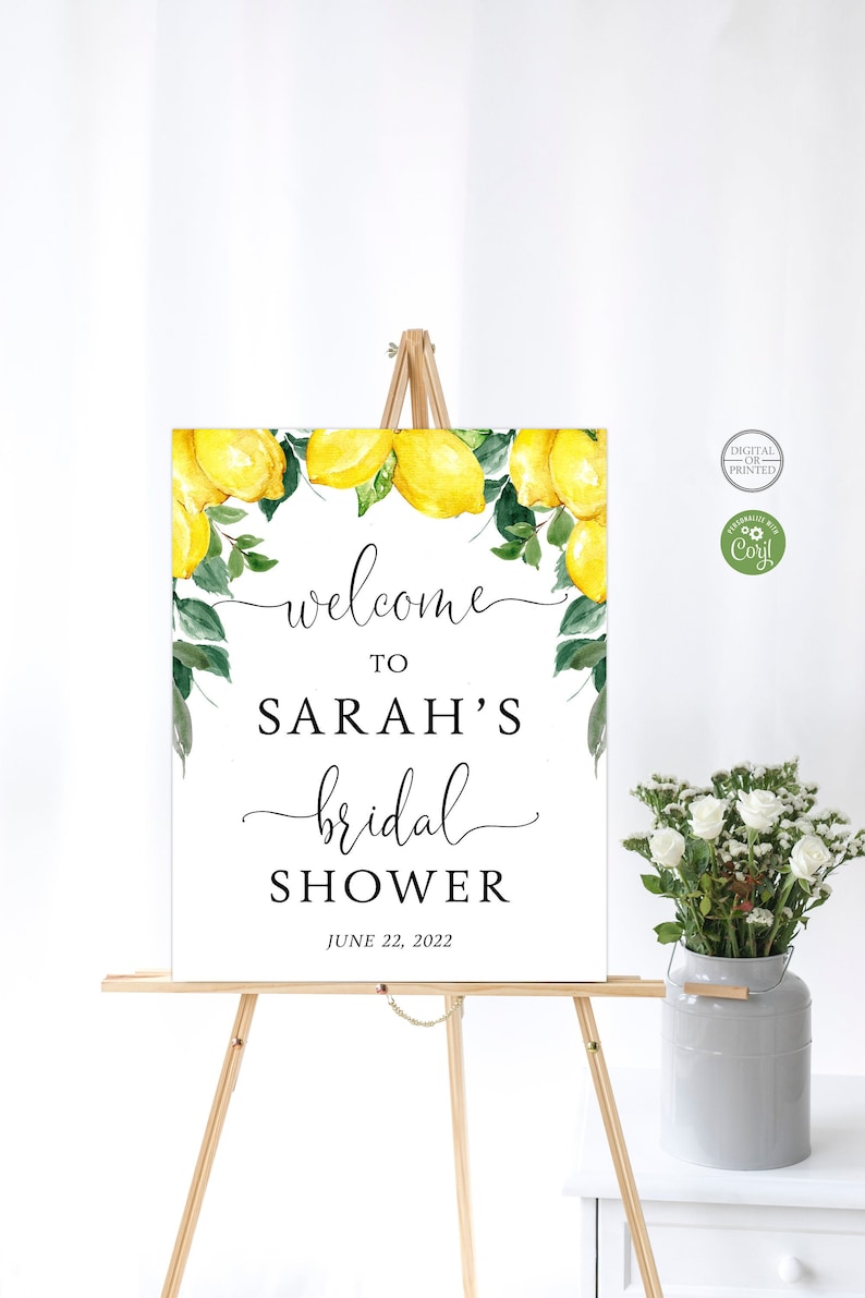 Peut inclure: Une pancarte de bienvenue pour le shower nuptial de Sarah avec un motif de citron et de verdure. La pancarte est imprim&eacute;e sur du papier cartonn&eacute; blanc et comporte du texte noir. La date du shower est le 22 juin 2022.