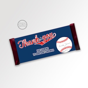 May include: Blue and red baseball-themed thank you favor tag with the text "Thank you" and "For coming to our baby shower". The tag also features a baseball with the name "Ericke Johnson" and the date "August 15, 2017".