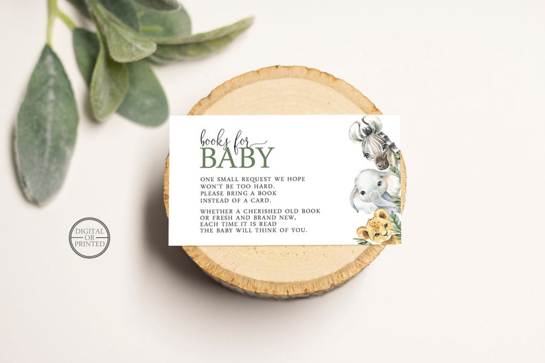 May include: A white card with green text that reads "books for baby". The card has a watercolor illustration of a zebra, elephant, and lion cub. The text reads "One small request we hope won't be too hard. Please bring a book instead of a card. Whether a cherished old book or fresh and brand new. Each time it is read the baby will think of you."