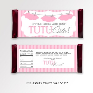 May include: Pink and white candy bar wrapper with a tutu and the text "Little girls are just Tutu Cute!" and "Tutu Kind!"  Fits Hershey candy bar 1.55 oz.
